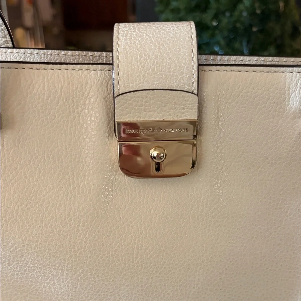 Kate Spade New York leather women’s Natacha Lovett street ivory satchel.